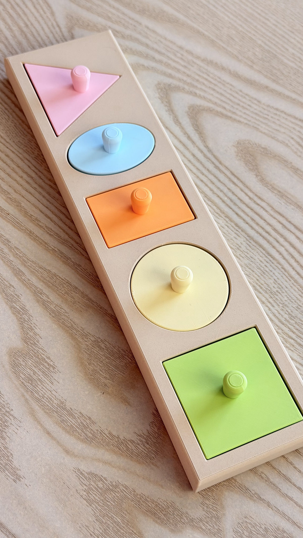 Knobbed Geometric Puzzle Board