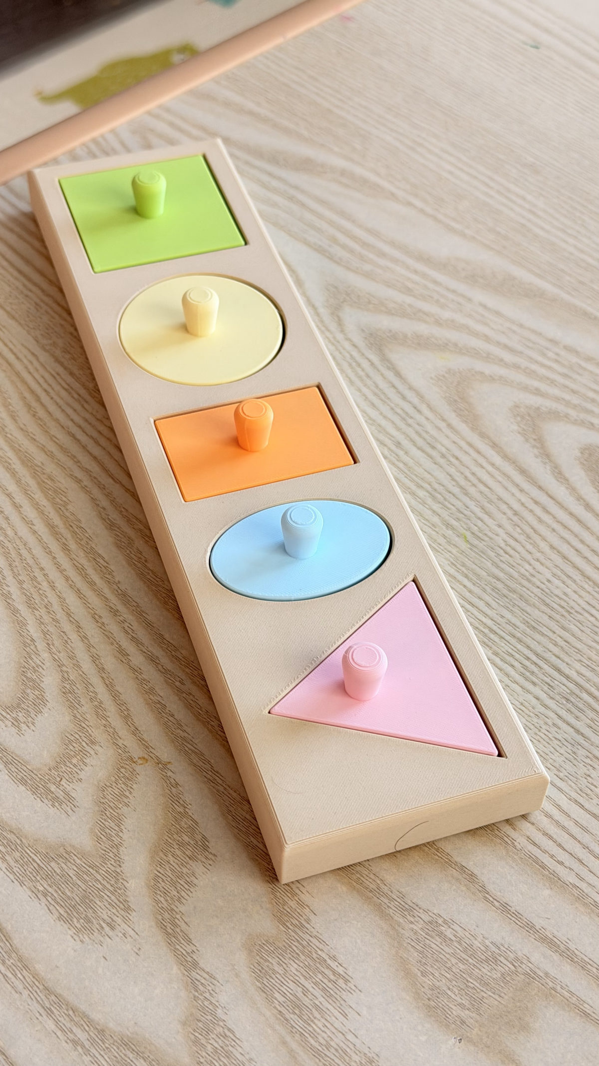 Knobbed Geometric Puzzle Board