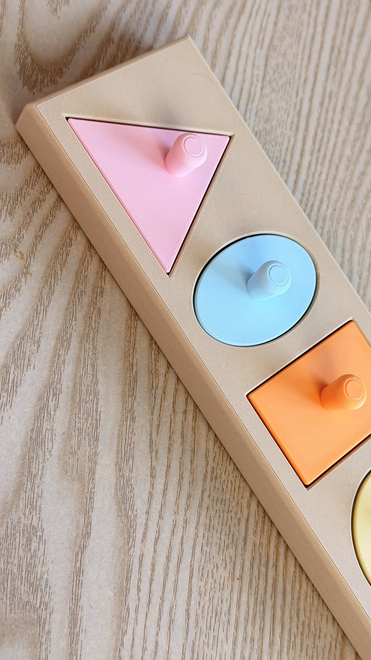 Knobbed Geometric Puzzle Board
